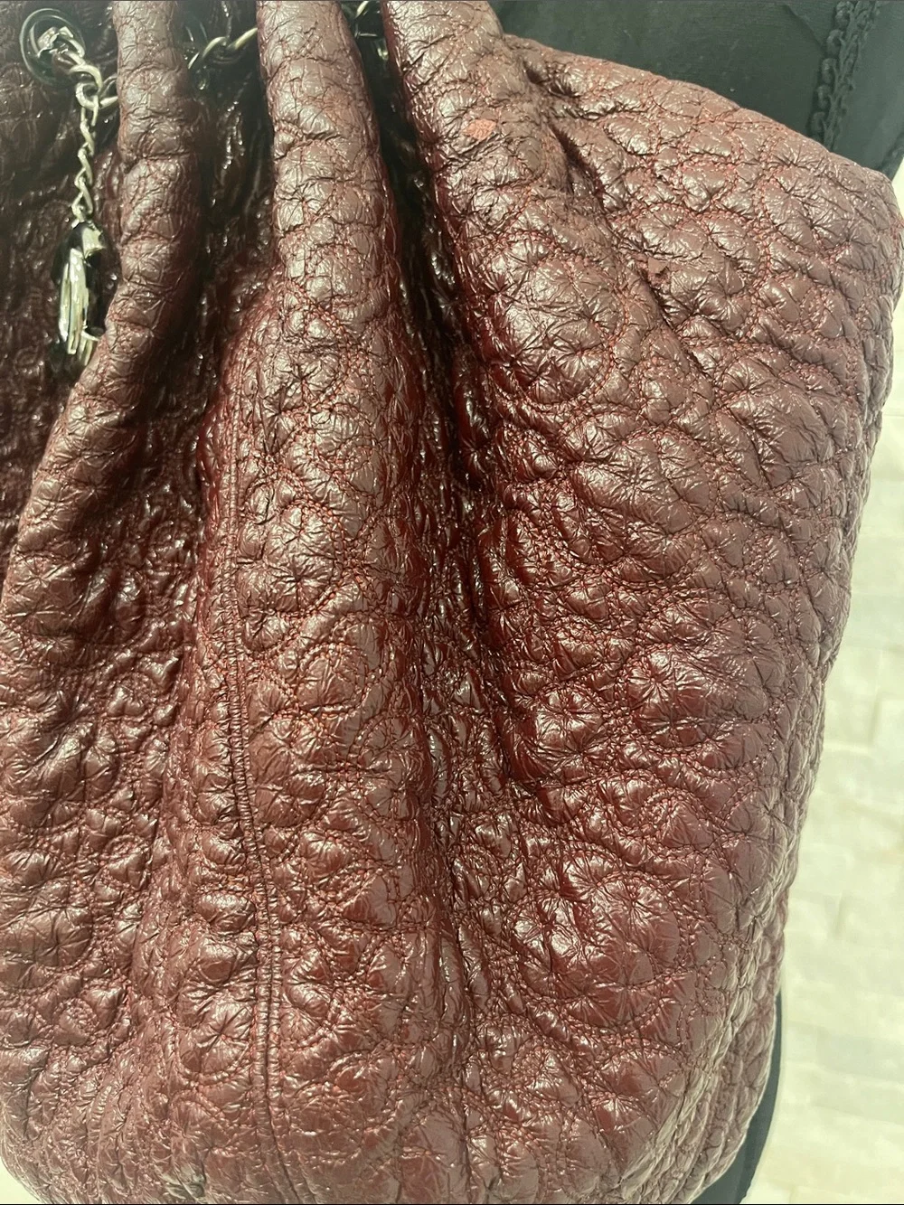 Authentic CHANEL Camelia in Bordeaux with CC Charm